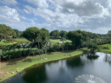 Beautifully renovated home with an amazing lake and golf view in on The Country Club At Boca Raton in Florida - for sale on GolfHomes.com, golf home, golf lot