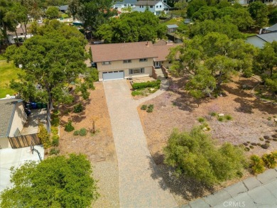 Discover this impressive 4-bedroom, 3-bath home offering 2,842 on Village Country Club in California - for sale on GolfHomes.com, golf home, golf lot