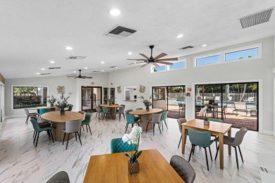Beautifully renovated home with an amazing lake and golf view in on The Country Club At Boca Raton in Florida - for sale on GolfHomes.com, golf home, golf lot