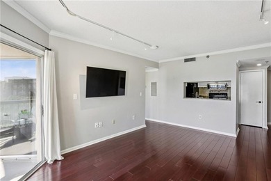 Experience elevated city living in this stunning one-bedroom on Bobby Jones Golf Club in Georgia - for sale on GolfHomes.com, golf home, golf lot