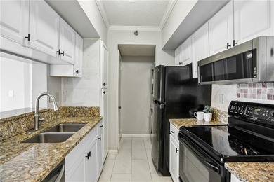 Experience elevated city living in this stunning one-bedroom on Bobby Jones Golf Club in Georgia - for sale on GolfHomes.com, golf home, golf lot