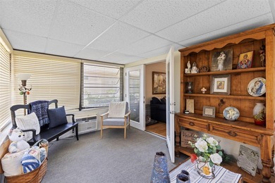 Introducing a beautiful one-bedroom, one-bath villa style on Highland Lakes Executive Golf Course in Florida - for sale on GolfHomes.com, golf home, golf lot