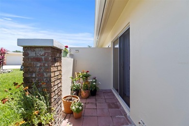 Introducing a beautiful one-bedroom, one-bath villa style on Highland Lakes Executive Golf Course in Florida - for sale on GolfHomes.com, golf home, golf lot