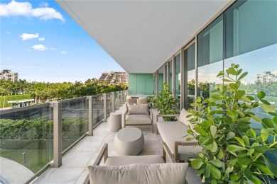 Live or invest in a luxurious haven nestled in the heart of Key on Crandon Golf At Key Biscayne in Florida - for sale on GolfHomes.com, golf home, golf lot