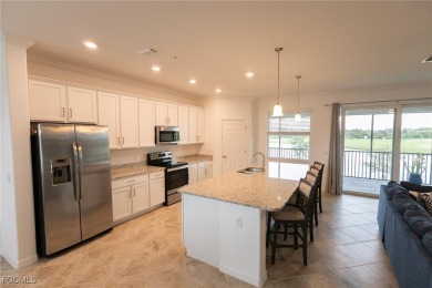 Step into resort living with this gorgeous upstairs Bay Creek on Heritage Landing Golf  in Florida - for sale on GolfHomes.com, golf home, golf lot