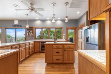 Experience lakeside living at its finest with this custom-built on The Coves Golf Course in Oklahoma - for sale on GolfHomes.com, golf home, golf lot
