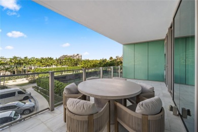 Live or invest in a luxurious haven nestled in the heart of Key on Crandon Golf At Key Biscayne in Florida - for sale on GolfHomes.com, golf home, golf lot