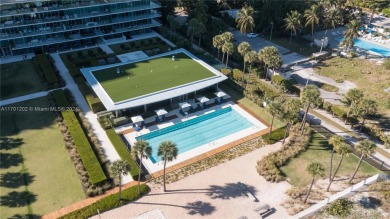 Live or invest in a luxurious haven nestled in the heart of Key on Crandon Golf At Key Biscayne in Florida - for sale on GolfHomes.com, golf home, golf lot