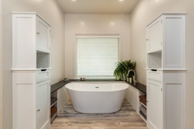 Experience lakeside living at its finest with this custom-built on The Coves Golf Course in Oklahoma - for sale on GolfHomes.com, golf home, golf lot