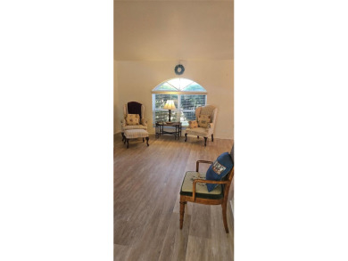 Under contract-accepting backup offers. NEW LUXURY VINYL PLANK on Rotonda Golf and Country Club The Palms Course in Florida - for sale on GolfHomes.com, golf home, golf lot