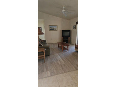 Under contract-accepting backup offers. NEW LUXURY VINYL PLANK on Rotonda Golf and Country Club The Palms Course in Florida - for sale on GolfHomes.com, golf home, golf lot