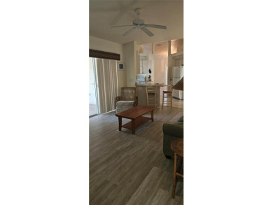 Under contract-accepting backup offers. NEW LUXURY VINYL PLANK on Rotonda Golf and Country Club The Palms Course in Florida - for sale on GolfHomes.com, golf home, golf lot