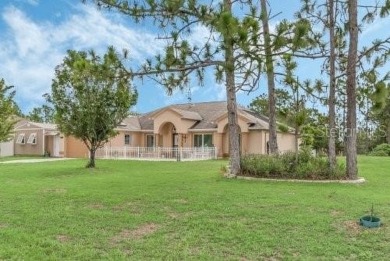 HUGE PRICE DROP! Pool home, on an acre, listed well under on Wedgefield Golf Club in Florida - for sale on GolfHomes.com, golf home, golf lot