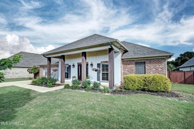 PERFECTION in Patrick Farms! Situated on a spacious golf course on Patrick Farms Golf Club in Mississippi - for sale on GolfHomes.com, golf home, golf lot