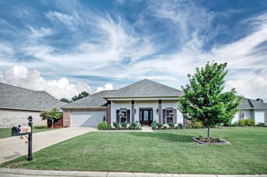 PERFECTION in Patrick Farms! Situated on a spacious golf course on Patrick Farms Golf Club in Mississippi - for sale on GolfHomes.com, golf home, golf lot