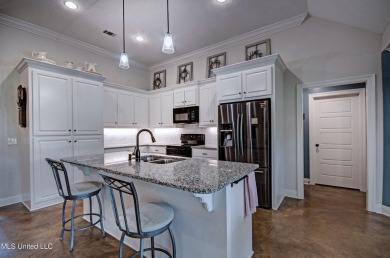 PERFECTION in Patrick Farms! Situated on a spacious golf course on Patrick Farms Golf Club in Mississippi - for sale on GolfHomes.com, golf home, golf lot