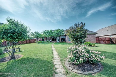 PERFECTION in Patrick Farms! Situated on a spacious golf course on Patrick Farms Golf Club in Mississippi - for sale on GolfHomes.com, golf home, golf lot