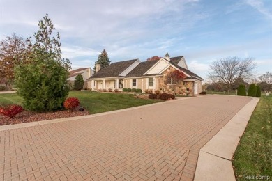 LUXURIOUS 3,915 SQ. FT. 4 BED 3 FULL BATH BRICK & STONE HOME on Riverview Highlands Golf Club  in Michigan - for sale on GolfHomes.com, golf home, golf lot