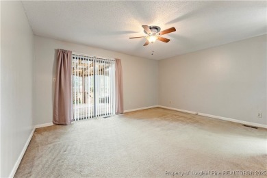 Nestled on the picturesque 10th fairway, this beautiful townhome on Gates Four Golf and Country Club in North Carolina - for sale on GolfHomes.com, golf home, golf lot