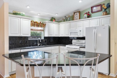 This beautiful 3 Bedroom, 2 Bath home in THE VILLASGES, Florida on The Links of Spruce Creek in Florida - for sale on GolfHomes.com, golf home, golf lot