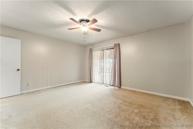 Nestled on the picturesque 10th fairway, this beautiful townhome on Gates Four Golf and Country Club in North Carolina - for sale on GolfHomes.com, golf home, golf lot