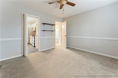 Nestled on the picturesque 10th fairway, this beautiful townhome on Gates Four Golf and Country Club in North Carolina - for sale on GolfHomes.com, golf home, golf lot