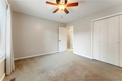 Nestled on the picturesque 10th fairway, this beautiful townhome on Gates Four Golf and Country Club in North Carolina - for sale on GolfHomes.com, golf home, golf lot