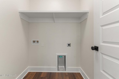 Brand New Coastal Estate Home. Minutes to quiet sleepy Pass on Pass Christian Isles Golf Club in Mississippi - for sale on GolfHomes.com, golf home, golf lot