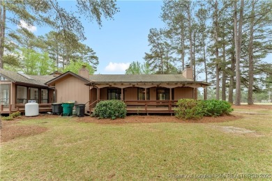 Nestled on the picturesque 10th fairway, this beautiful townhome on Gates Four Golf and Country Club in North Carolina - for sale on GolfHomes.com, golf home, golf lot