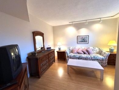 Beautiful Golf course view condo  in the 55+ community of the on Poinciana Golf Club in Florida - for sale on GolfHomes.com, golf home, golf lot