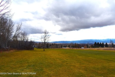 This charming home is nestled on a quiet treed street, offers a on Cedar Creek Golf Course in Wyoming - for sale on GolfHomes.com, golf home, golf lot