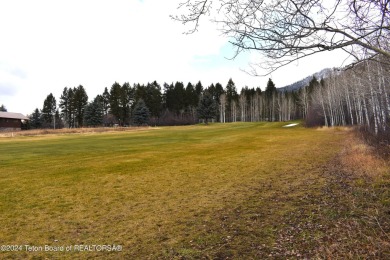 This charming home is nestled on a quiet treed street, offers a on Cedar Creek Golf Course in Wyoming - for sale on GolfHomes.com, golf home, golf lot