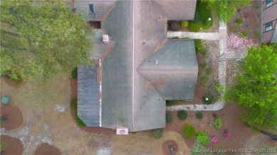 Nestled on the picturesque 10th fairway, this beautiful townhome on Gates Four Golf and Country Club in North Carolina - for sale on GolfHomes.com, golf home, golf lot