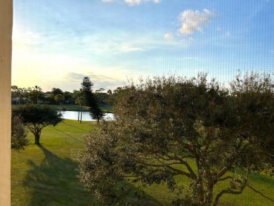Beautiful Golf course view condo  in the 55+ community of the on Poinciana Golf Club in Florida - for sale on GolfHomes.com, golf home, golf lot