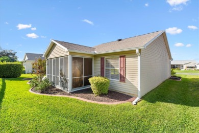 This beautiful 3 Bedroom, 2 Bath home in THE VILLASGES, Florida on The Links of Spruce Creek in Florida - for sale on GolfHomes.com, golf home, golf lot
