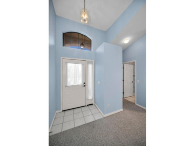 IN TIMBER GREENS A 55+ GATED GOLF COMMUNITY... This 2-bedroom 2 on Timber Greens Country Club in Florida - for sale on GolfHomes.com, golf home, golf lot