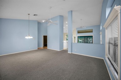 IN TIMBER GREENS A 55+ GATED GOLF COMMUNITY... This 2-bedroom 2 on Timber Greens Country Club in Florida - for sale on GolfHomes.com, golf home, golf lot