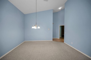 IN TIMBER GREENS A 55+ GATED GOLF COMMUNITY... This 2-bedroom 2 on Timber Greens Country Club in Florida - for sale on GolfHomes.com, golf home, golf lot