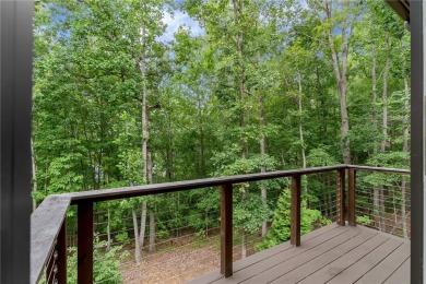 Offered fully furnished and move-in ready, this 3,700 sq ft on The Cliffs At Keowee Springs in South Carolina - for sale on GolfHomes.com, golf home, golf lot