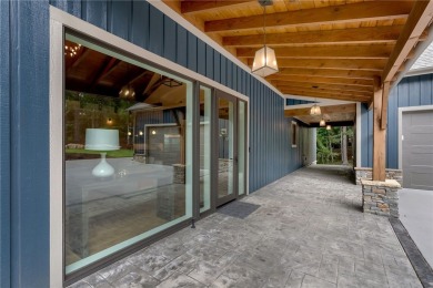 Offered fully furnished and move-in ready, this 3,700 sq ft on The Cliffs At Keowee Springs in South Carolina - for sale on GolfHomes.com, golf home, golf lot