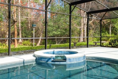 Step into elegance with this exceptional Pool Home nestled in on The Grand Club Cypress Course in Florida - for sale on GolfHomes.com, golf home, golf lot