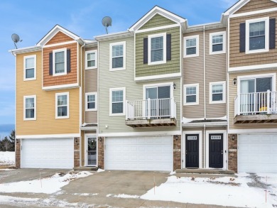 Welcome home to this stunning 2-bedroom, 2.5-bathroom townhome on Otter Creek Golf Course in Iowa - for sale on GolfHomes.com, golf home, golf lot