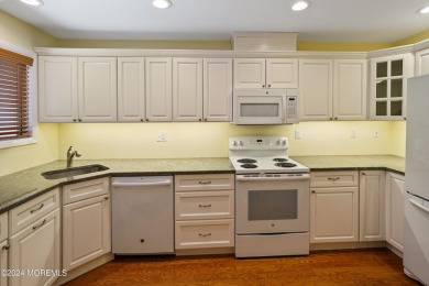 SOUGHT AFTER LOWER LEVEL END UNIT in the Gated Active Adult on Shadow Lake Village in New Jersey - for sale on GolfHomes.com, golf home, golf lot
