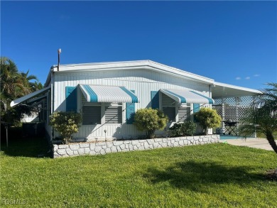 Gorgeous, updated home in much desired Tamiami Village. This on Six Lakes Country Club in Florida - for sale on GolfHomes.com, golf home, golf lot