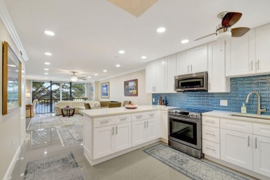 Enjoy a full lake view from extended living area in this 2/2 on Fountains Golf and Country Club in Florida - for sale on GolfHomes.com, golf home, golf lot
