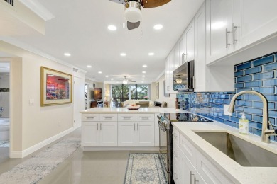 Enjoy a full lake view from extended living area in this 2/2 on Fountains Golf and Country Club in Florida - for sale on GolfHomes.com, golf home, golf lot