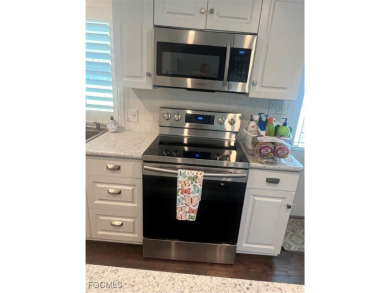 Gorgeous, updated home in much desired Tamiami Village. This on Six Lakes Country Club in Florida - for sale on GolfHomes.com, golf home, golf lot