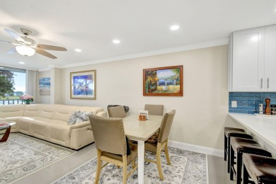 Enjoy a full lake view from extended living area in this 2/2 on Fountains Golf and Country Club in Florida - for sale on GolfHomes.com, golf home, golf lot