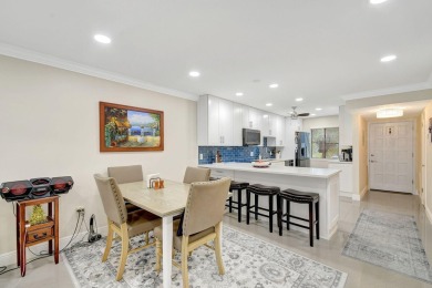 Enjoy a full lake view from extended living area in this 2/2 on Fountains Golf and Country Club in Florida - for sale on GolfHomes.com, golf home, golf lot