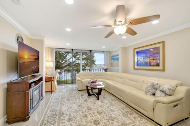 Enjoy a full lake view from extended living area in this 2/2 on Fountains Golf and Country Club in Florida - for sale on GolfHomes.com, golf home, golf lot